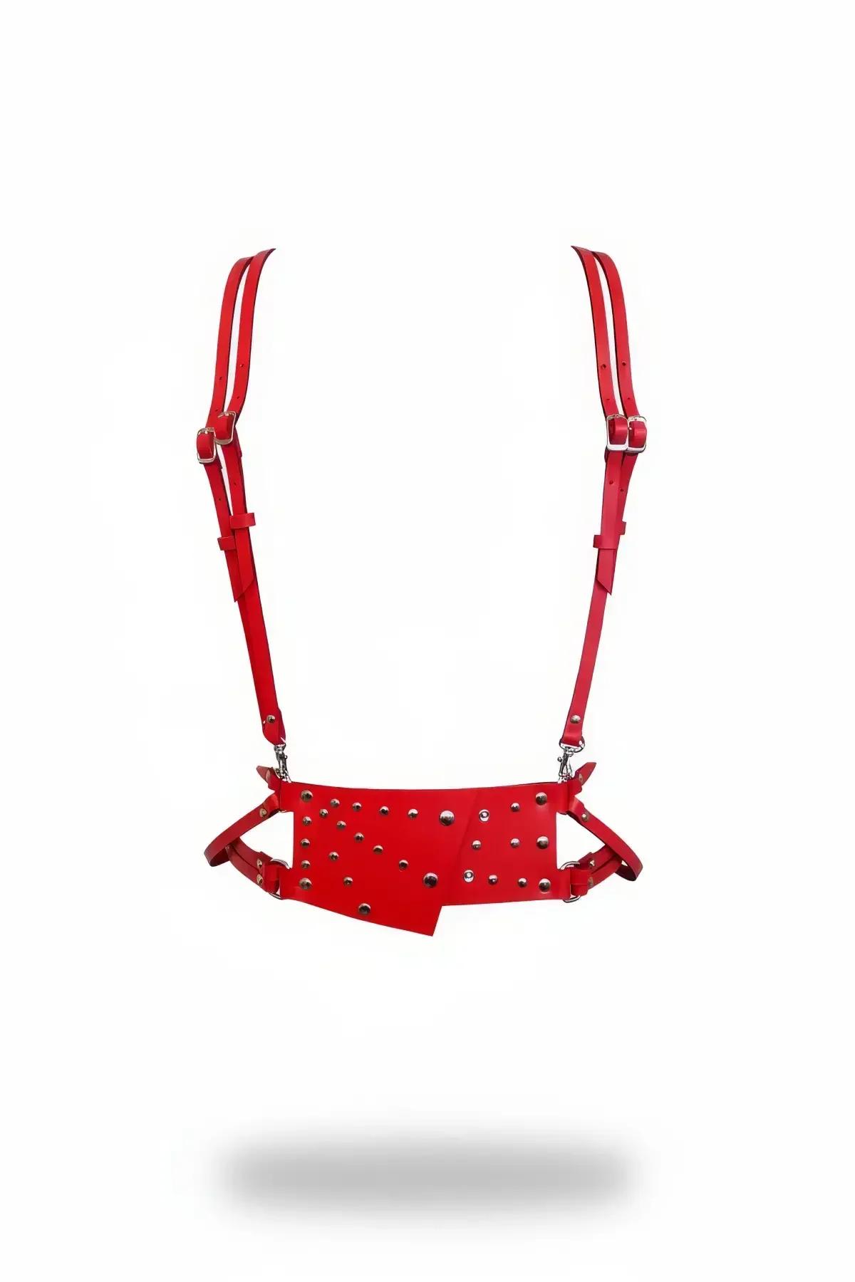 Red faux leather asymmetrical studded underbust harness with silver dome studs and adjustable shoulder straps