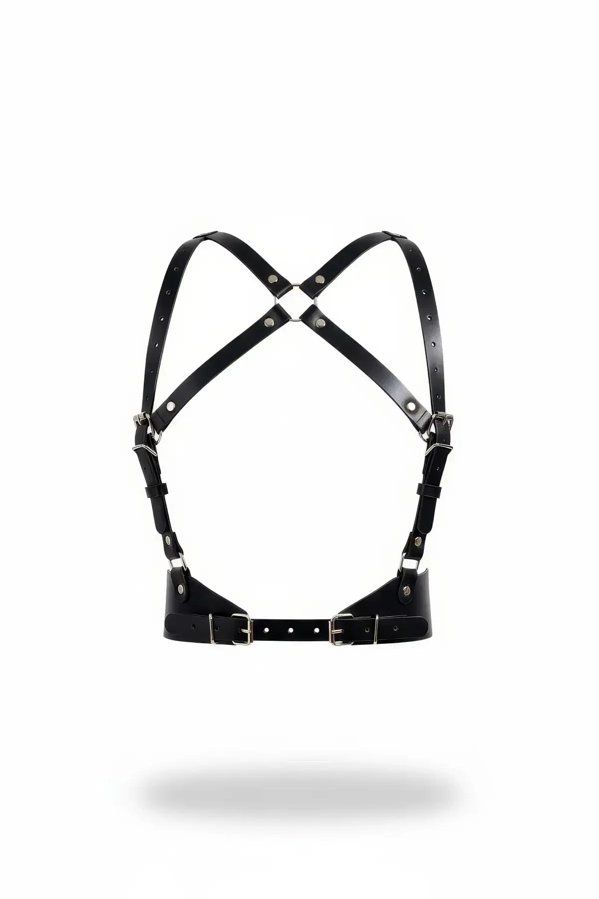 black faux leather cross-back chest harness with X-strap silhouette and wide silver-buckle underbust band