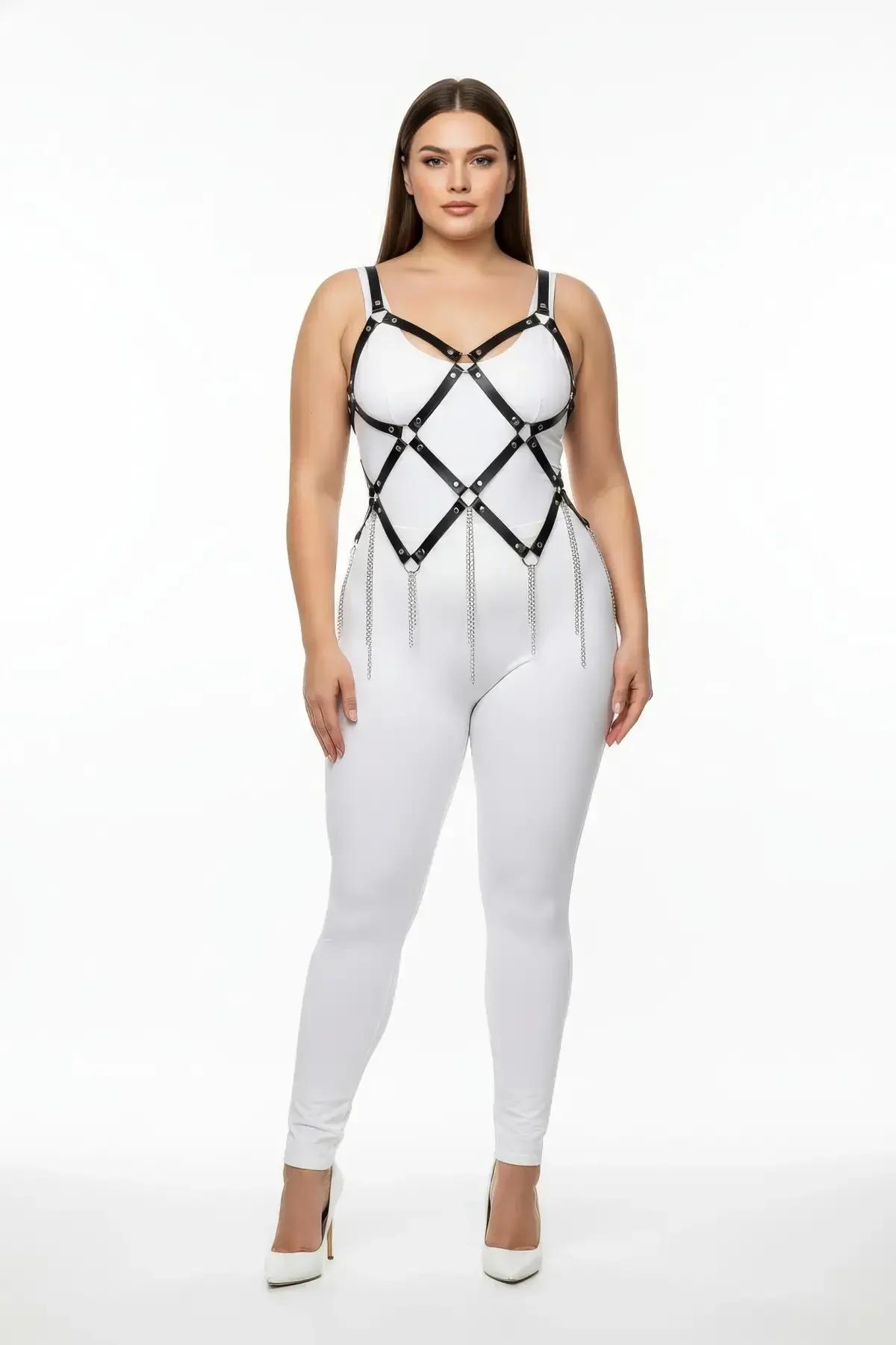 black faux leather full body harness diamond lattice with silver chain dangle worn over white catsuit