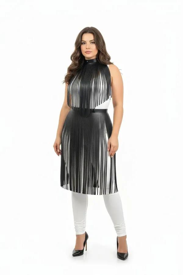 Black vegan leather fringe overlay harness dress with high mock neck collar and cinching waist belt, midi length