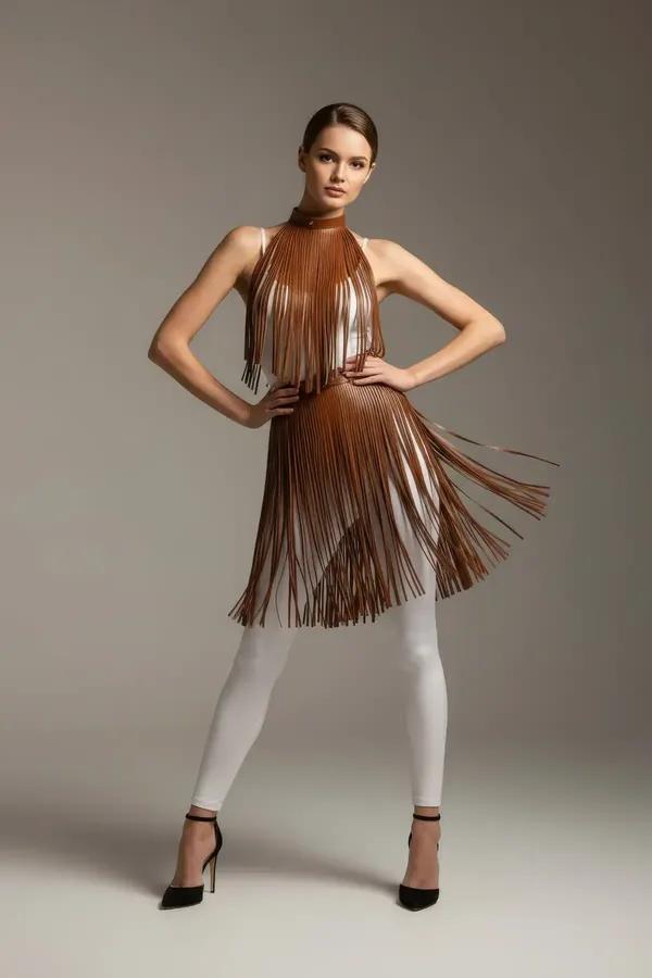 tan faux leather fringe halter harness set with waist skirt overlay, warm brown color, cascading fringe strips front view