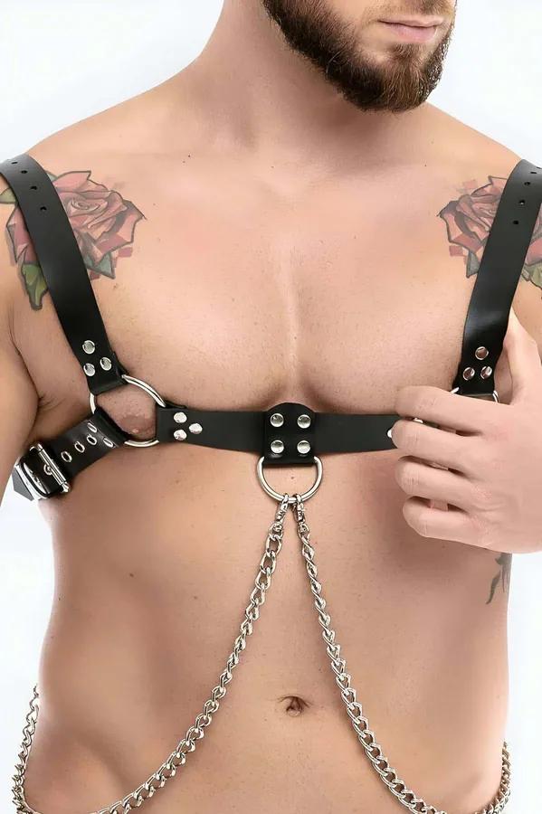 black vegan leather mens chest harness with silver O-ring and draping link chains worn on bare torso